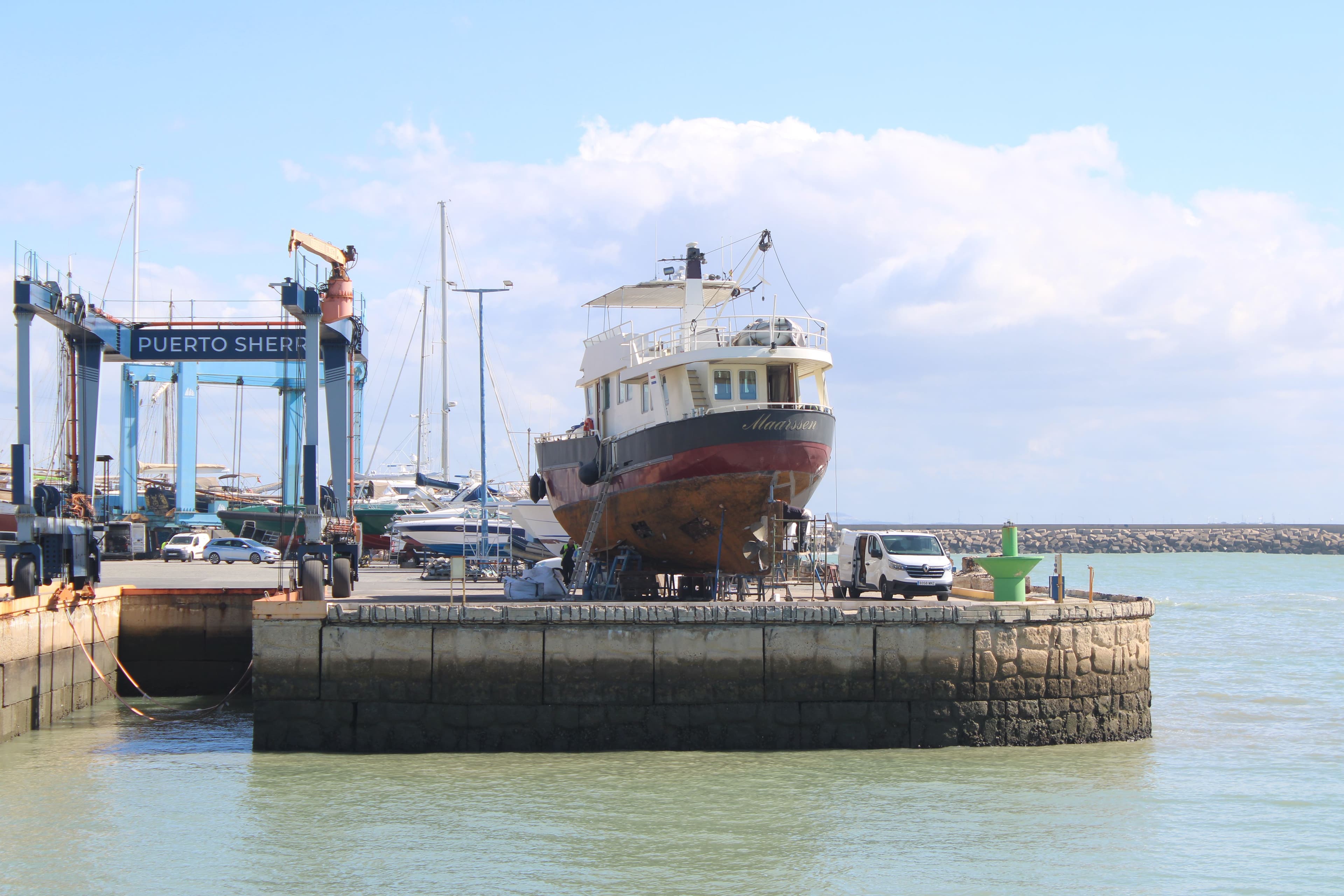 Sheeted cargo rigged for lifting out of the hold
